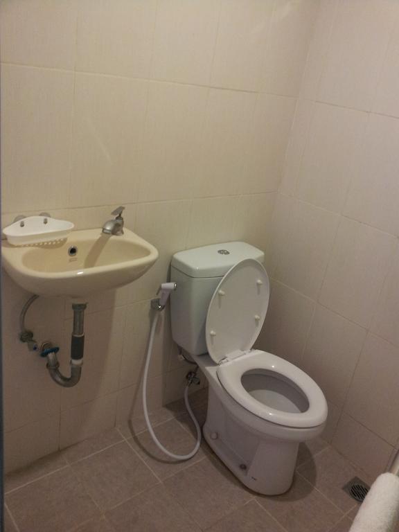 Loxy Inn Surabaja Pokoj fotografie